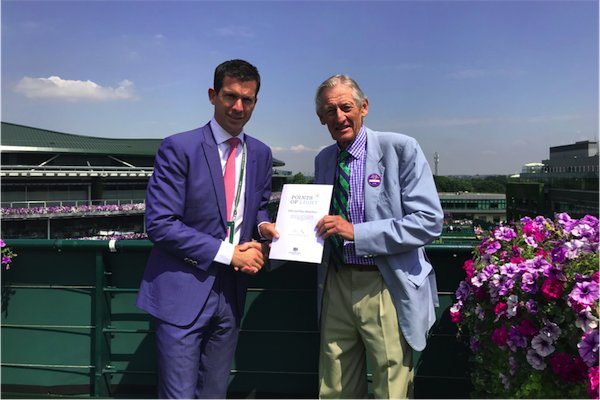 Mike Stotesbury receiving his award from Tim Henman
