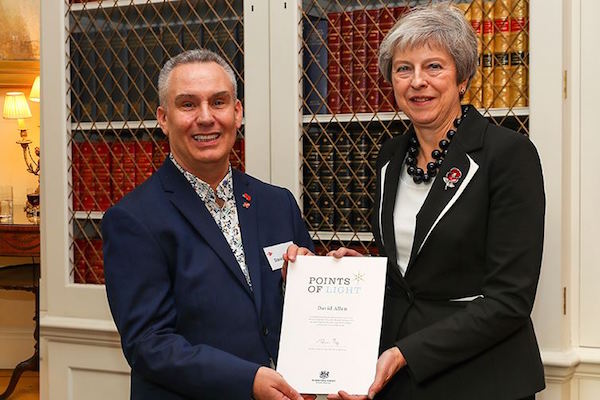 David Allen receiving his award from the Prime Minister