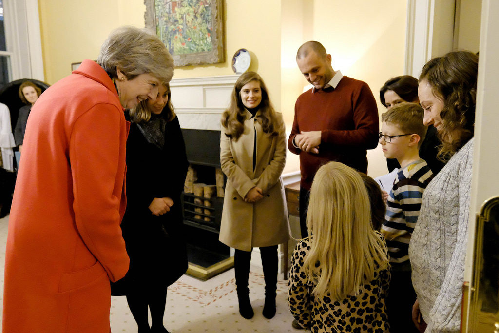 PM Theresa May meeting Point of Light Maisie Sly at Downing Street