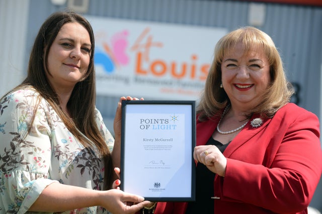Kirsty McGurrell receiving her award from Sharon Hodgson MP
