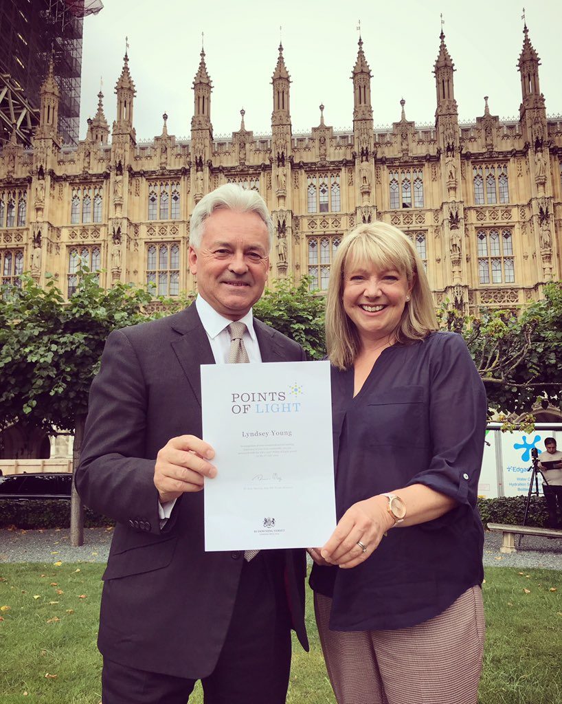 Lyndsey accepted her award from Sir Alan Duncan