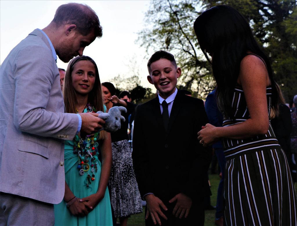 Duke and Duchess of Sussex speak with Jade Bothma and Hunter Mitchell, Commonwealth Points of Light award winners representing South Africa