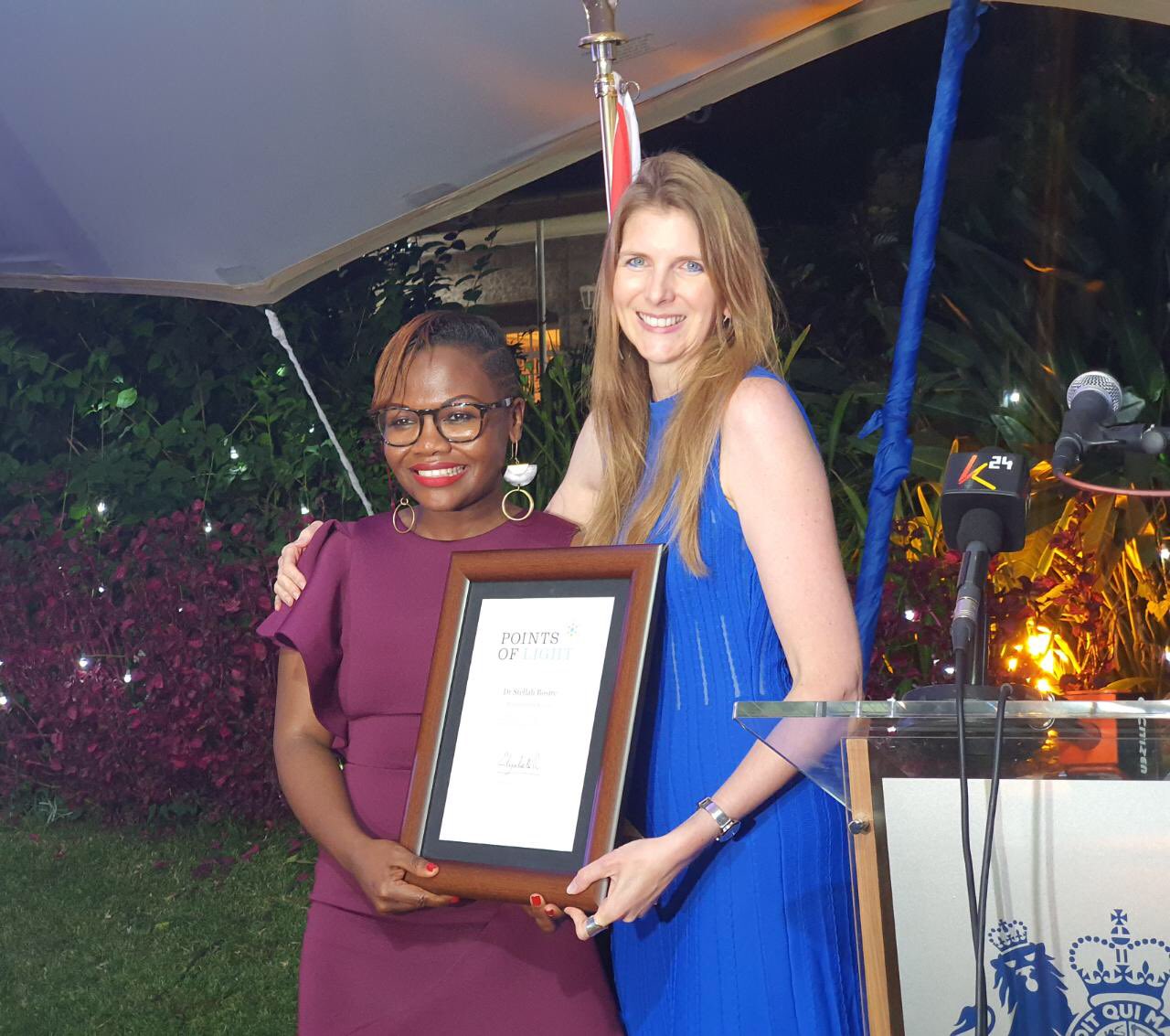 Dr Stellah Bosire receiving her award from British High Commissioner Jane Marriott