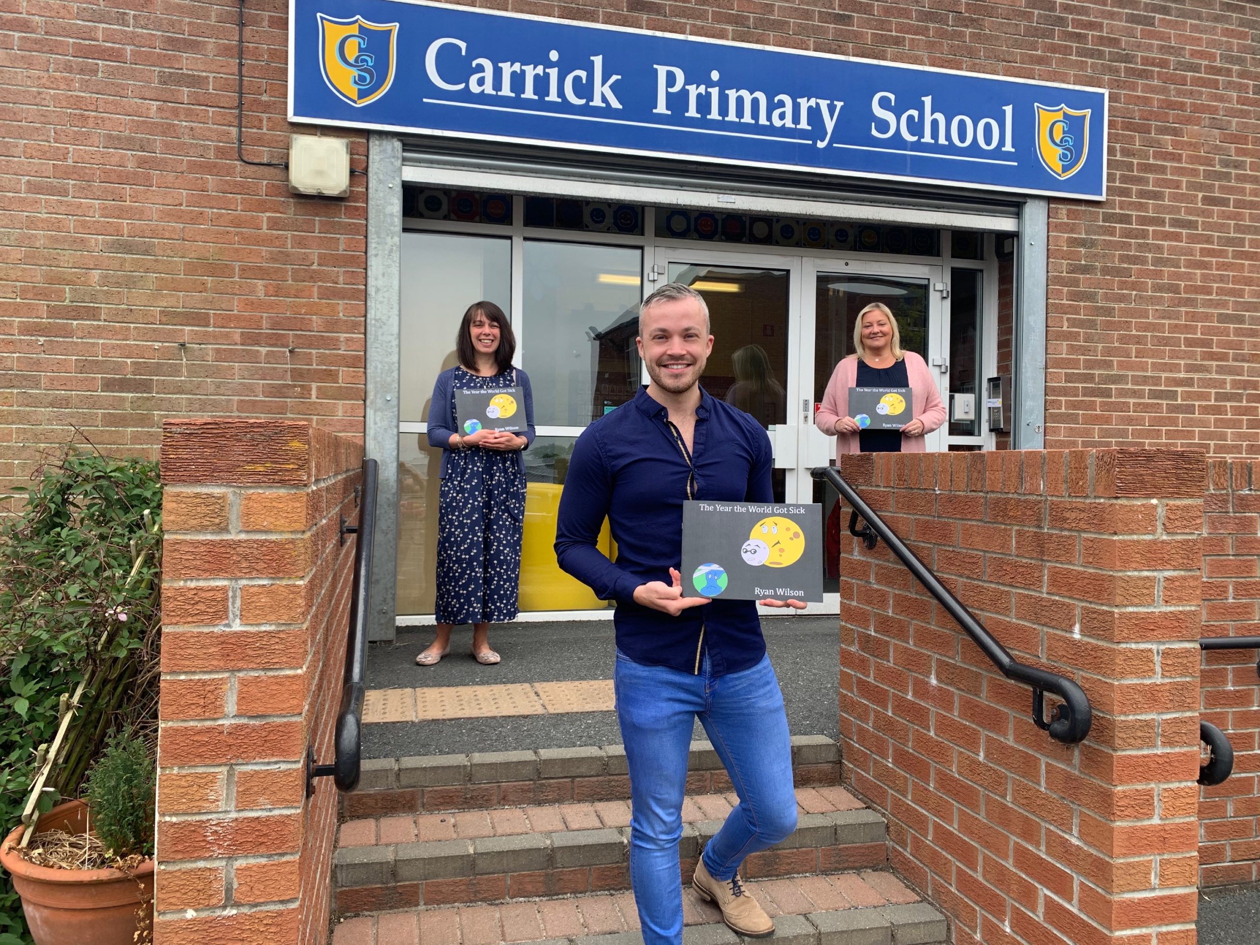 Ryan with staff at Carrick Primary School