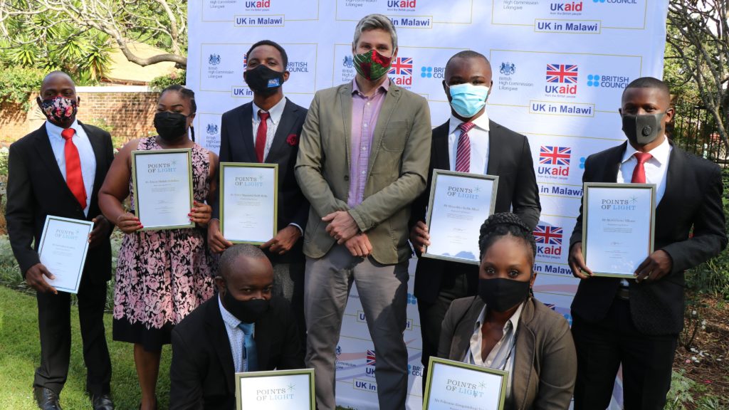 British High Commissioner to Malawi David Beer with seven of the members behind the initiative