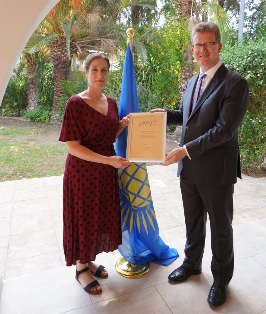 Patricia Phaedonos receiving her Commonwealth Points of Light award from British High Commissioner to Cyprus Stephen Lillie