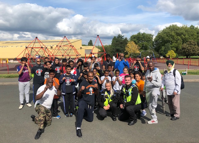Kash and participants following one of his sessions in Handsworth Park