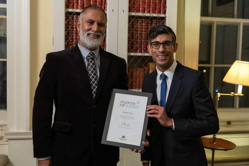 Prime Minister Rishi Sunak presents Khalid Raza with his Points of Light award at Downing Street