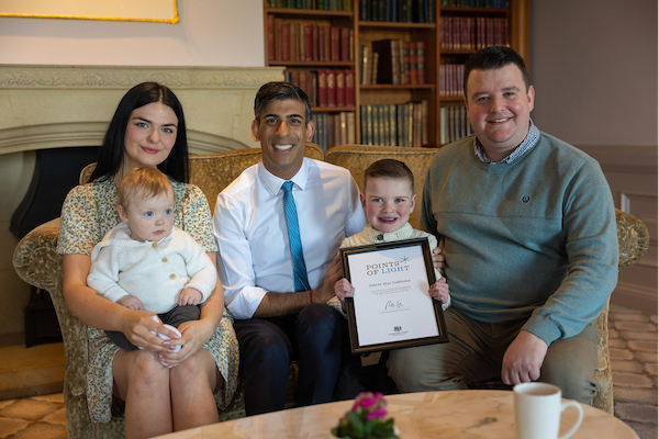 The Prime Minister Rishi Sunak meets 6yr old Daithi Mac Gabhann, along with his parents Mairtin and Seph and his baby brother Cairbre, and he presented him with a Point of Light Award.